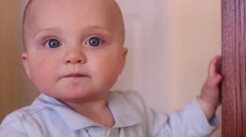 Baby walking up to camera cu Stock-Footage 22534713