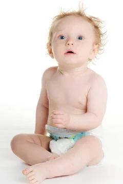 Baby in windel süßes baby in windel spielt auf weißem grund ,model release Stock Photos