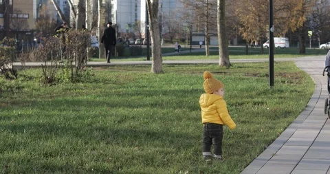 Baby in a yellow jacket Stock-Footage 121029202