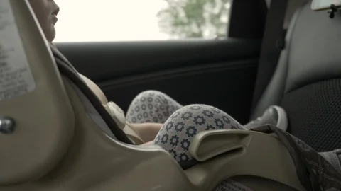 BabyRidingInCarseat WatchingVideo  Stock Footage 98091941