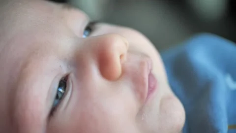 Baby's face close-up, lips and eyes of a newborn Video stock 241526120