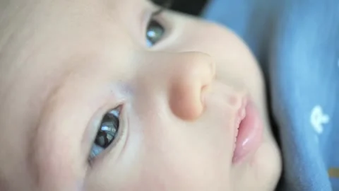 Baby's face close-up, lips and eyes of a newborn Stock Footage 249107025