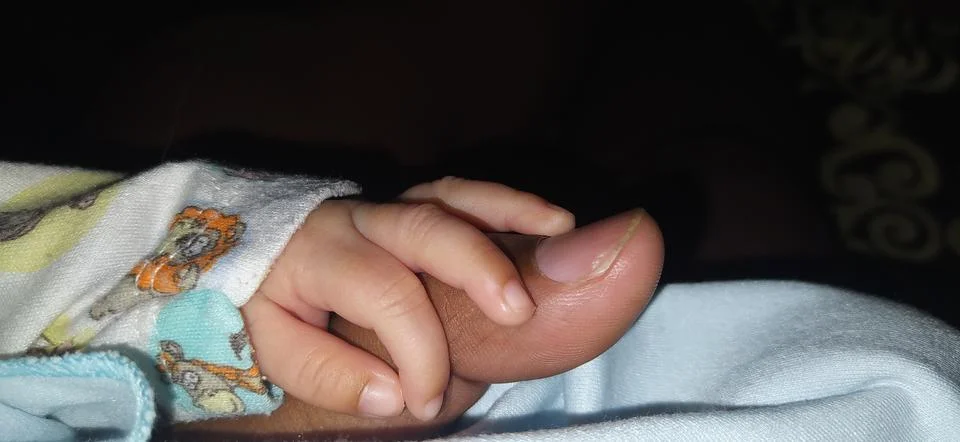 Baby's finger Stock Photos