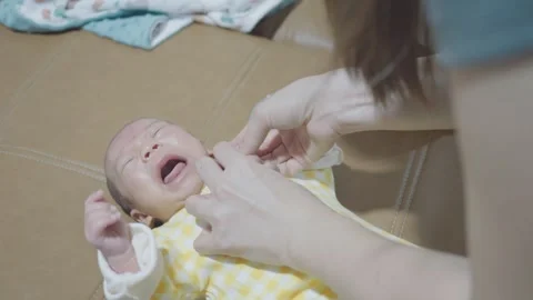 Baby's First Cry: A Tender Moment Stock Footage 318629230