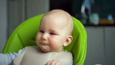 Babys first vegetable feeding Stock Footage 310658865