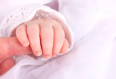 Baby's hand Stock Photos