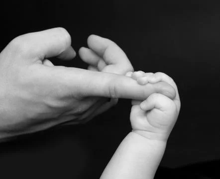 Baby's hand Stock Photos
