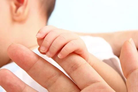 Baby's hand Stock Photos