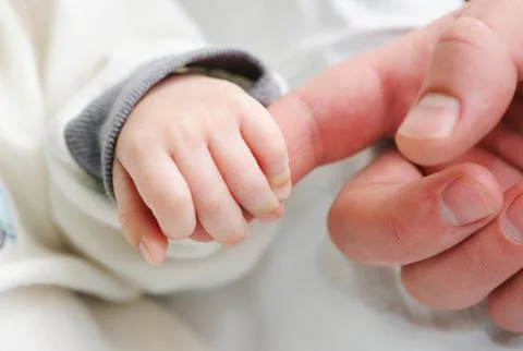 Baby's hand Stock Photos