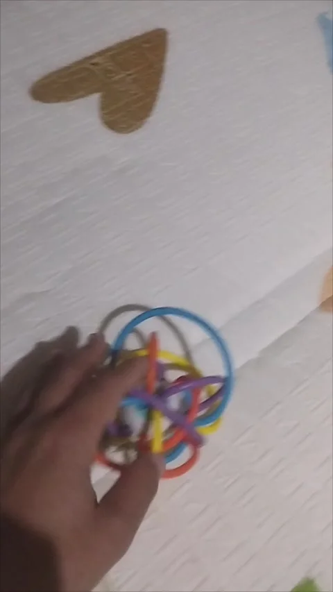 Baby's little baby's colored bite toy is very comfortable to use Stock Footage 291592292