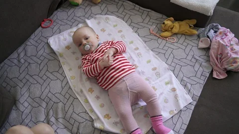 Baby's reaction when she was taken away by a pacifier. Stock Footage 121975324