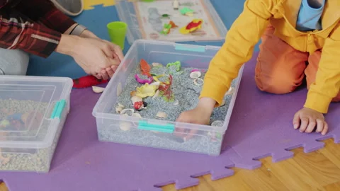 A babysitter spends quality time playing games with a little boy in the car Stock Footage 272533907