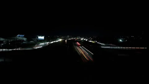 Bac Ninh highway night traffic light trails near high-tech industrial zone. Stock Footage 345426869