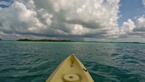 Bacalar lagoon on a Kayak Stock Footage 229736875