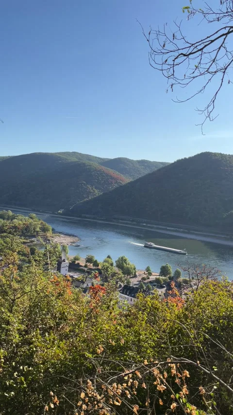 Bacharach, Germany, August 11, 2026 selective focus on freight barge moving.. Stock Footage 345202370