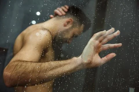 Bachelor man daily routine taking shower single lifestyle concept looking down Stock Photos