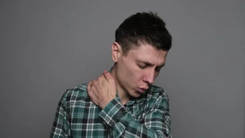 Back and neck pain, cervical spine hernia, man with backache at home, health pro Video stock 297002209