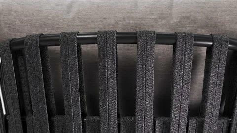 The back and upholstered cushion of a beautiful chair in the interior Stock Footage 219427158