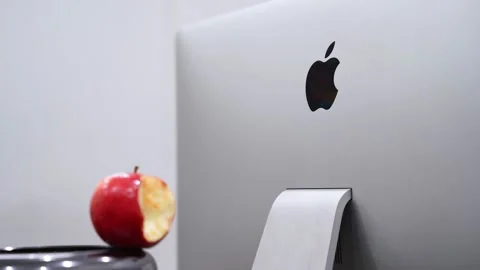 Back of Apple iMac with Bitten Red Apple Stockbeeldmateriaal 336328457