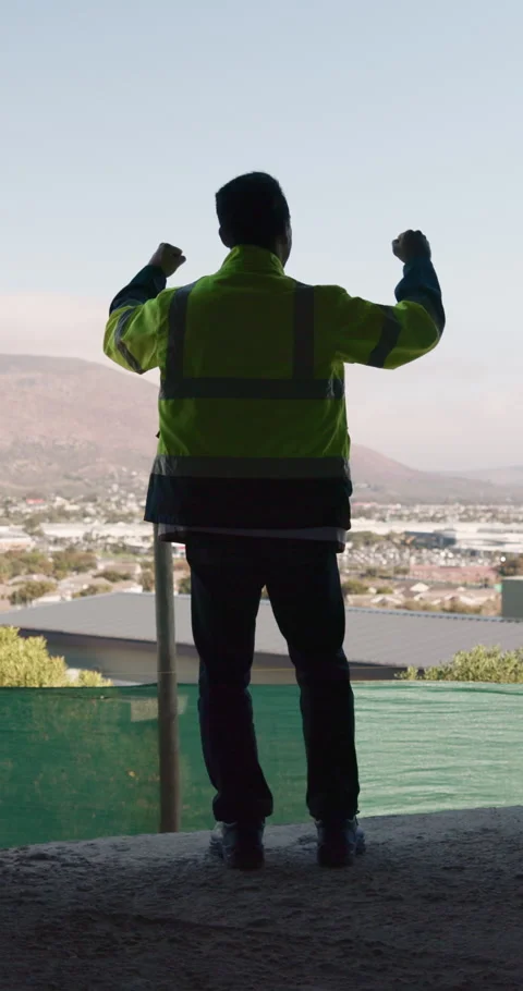 Back, architect and man with celebration at construction site, development Stock Footage 336265435