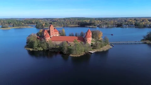 Back-away shot of Trakai castle Stock Footage 255928266