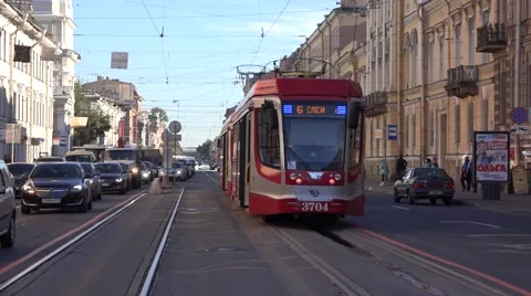 Back-to-back couple 2-car double-sided tram departs from temporary stub terminus Stock Footage 67576886