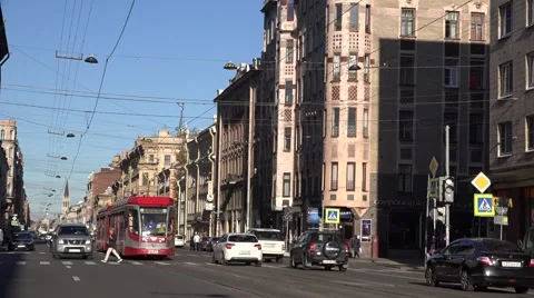 Back-to-back coupled 2-car tram runs along Sredniy Prospect at route 6 Stock Footage 67576861