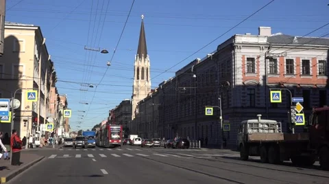 Back-to-back coupled 2-car tram runs along Sredniy Prospect at route 6 Stock Footage 67576862