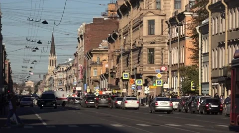 Back-to-back coupled 2-car tram runs along Sredniy Prospect on route 6 Stock Footage 67576873