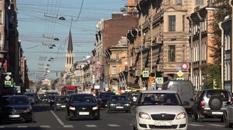 Back-to-back coupled 2-car tram runs along Sredniy Prospect on route 6 Stock Footage 67576891