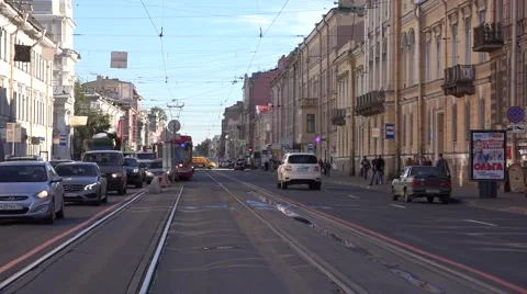 Back-to-back coupled 2-car double-sided tram arrives to temporary stub terminus Stock Footage 67576892