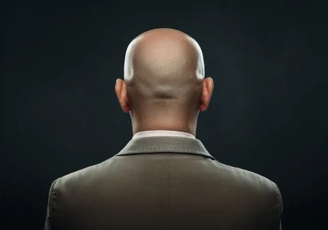 The back of a bald man in suit Stock Photos