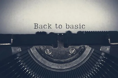 Back to basic text on an old typewriter. Stock Photos