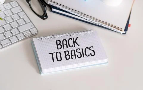 Back to Basics two notepads with text on a white background next to a keybo.. Stock Photos