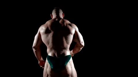 The back of a bodybuilder is a symbol of determination and strength  Stock Footage 300887258