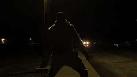 Back Of A Boy Running Under A Streetlight While Dribbling A Basketball - Wide 스톡 동영상 148334411