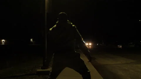 Back Of A Boy Running Under A Streetlight While Dribbling A Basketball - Wide 스톡 동영상 148335390