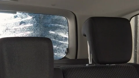 Back car window, slow motion car wash machine Stockbeeldmateriaal 103493903