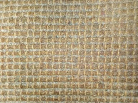 The back of the carpet with glued threads Photos