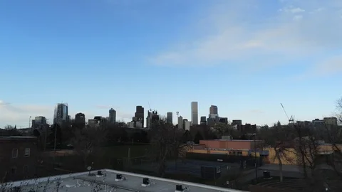 Back of city to beautiful trees - Drone camera goes back and down Video stock 128797094