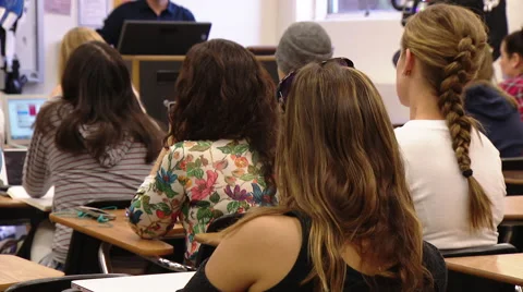 Back of college students heads 2 Stock Footage 56557573