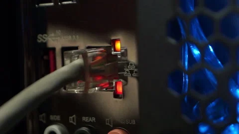 The back of the computer with an internet cable connected Stock Footage 104644704
