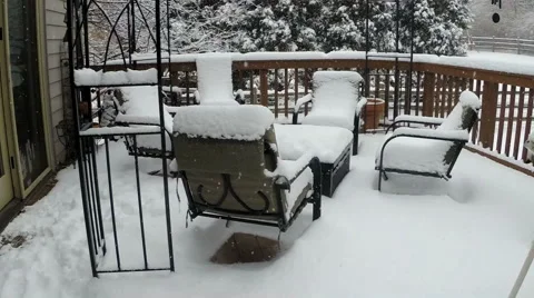 Back deck / patio in snowfall Stock Footage 47154036