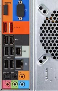 The back of a desktop computer and peripherals. Close-up. Stock Photos