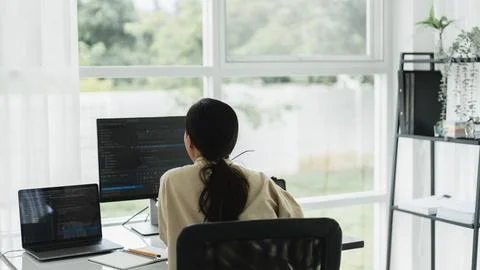 Back of developer programmer programming code to developing web and applica.. Foto stock