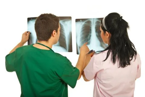 Back of doctors checking X-rays Stock Photos