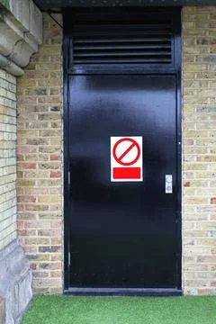 Back door Black back door emergency exit and fire escape Copyright: xZoona... Stock Photos
