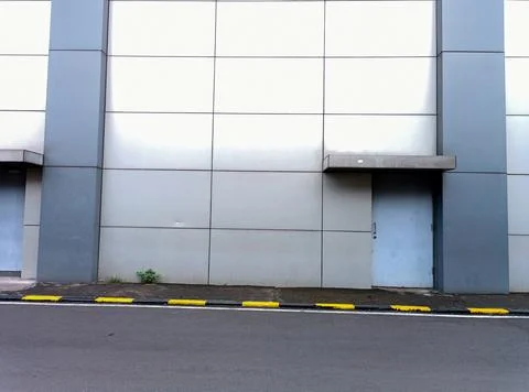 Back door entry building Stock Photos