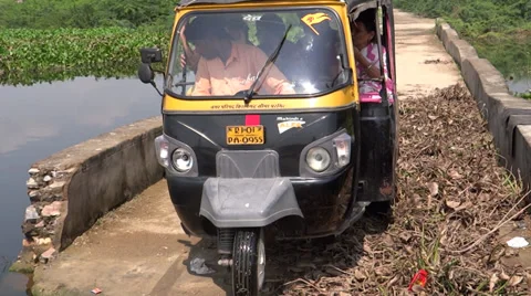 Back driven auto rickshaw Stock Footage 31884762