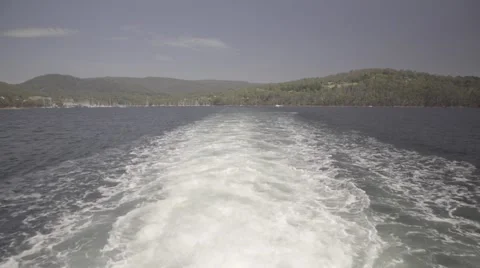 Back end of boat leaving boats background Stock Footage 68707916
